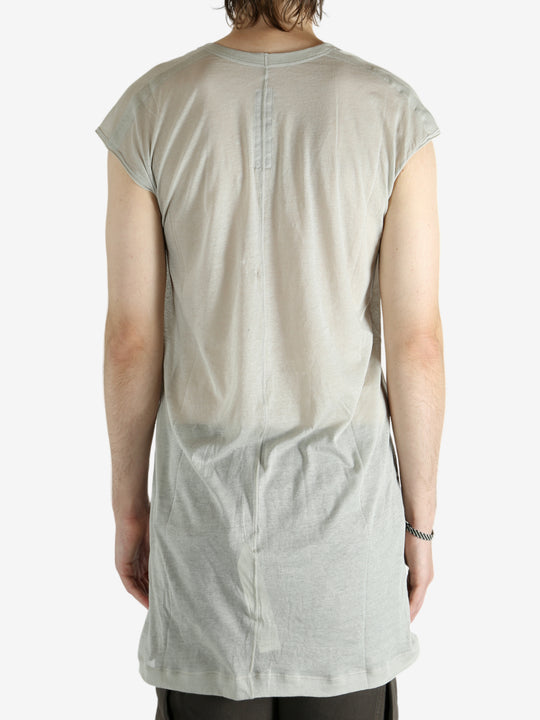 White t-shirt worn by a person, showing the shirt's fit