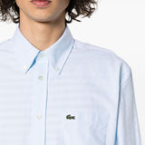 Close up of blue shirts, showing texture of the cotton fabric