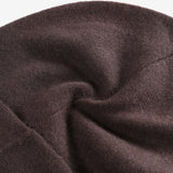 Close up of brown hats, showing texture of the cashmere fabric