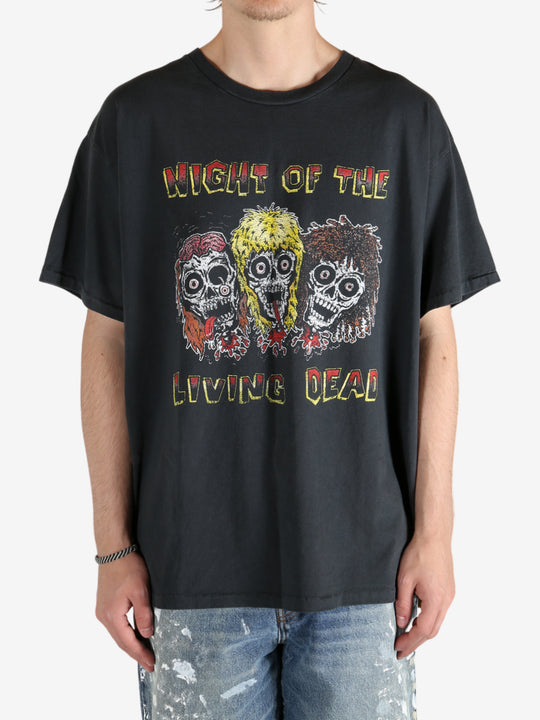 Black t-shirt worn by a person, showing the t-shirt's fit