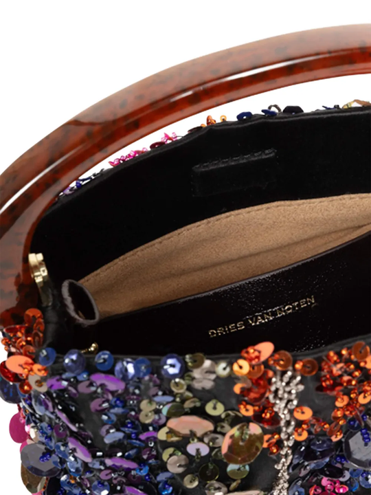 Close up of orange bag, showing texture of the Viscose and Silk fabric