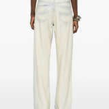 grey pants worn by a person, showing the pants' fit