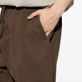 Close up of Brown pants, showing texture of the cotton fabric