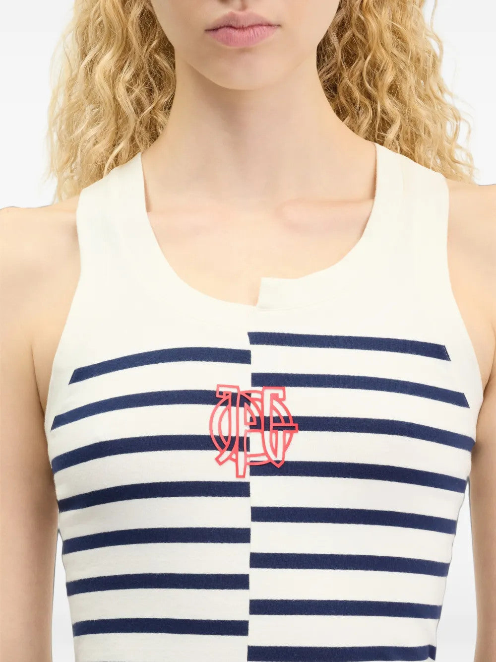 Navy top worn by a person, showing the top fit