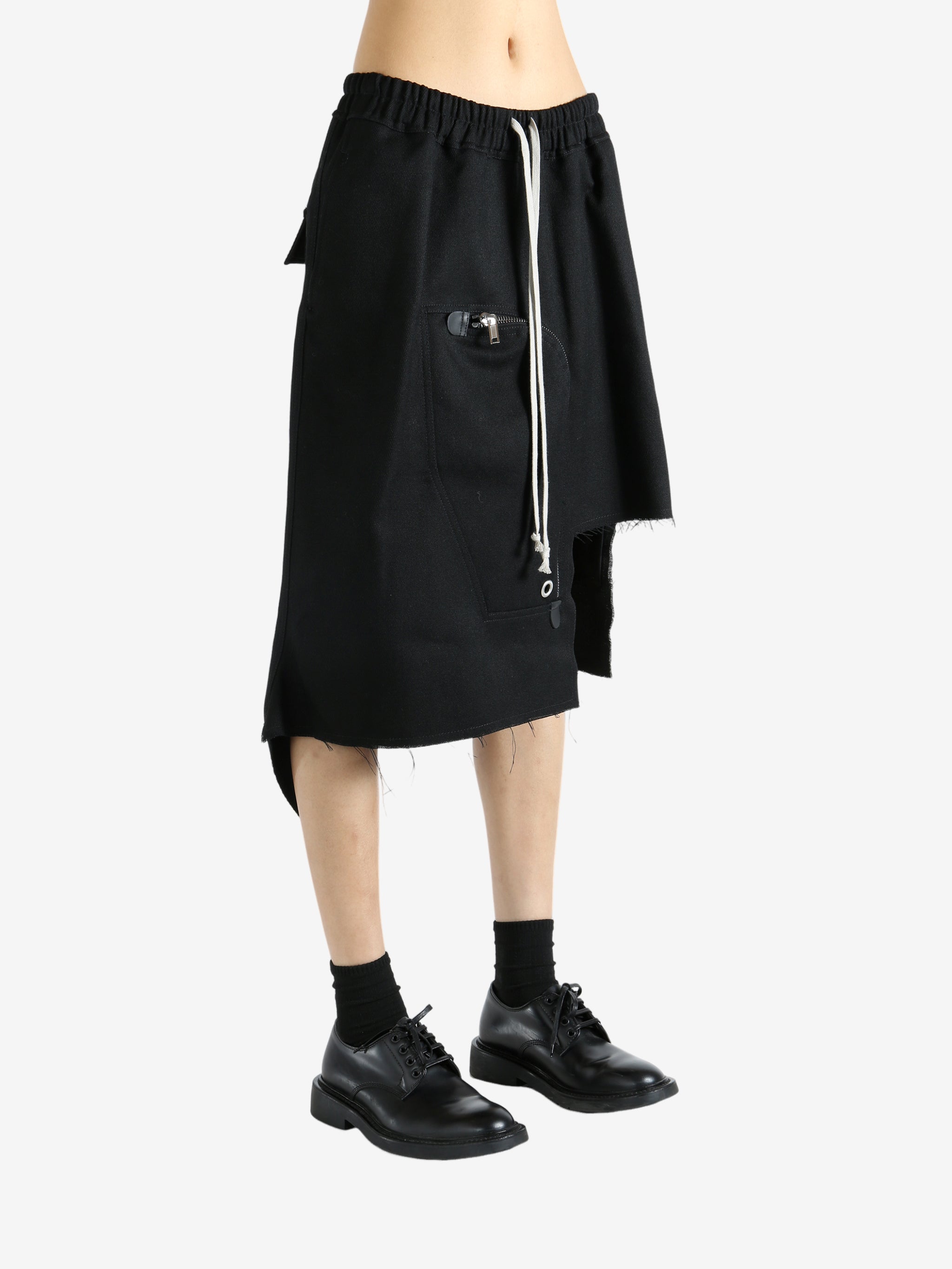 Black skirt worn by a person, showing the skirt fit