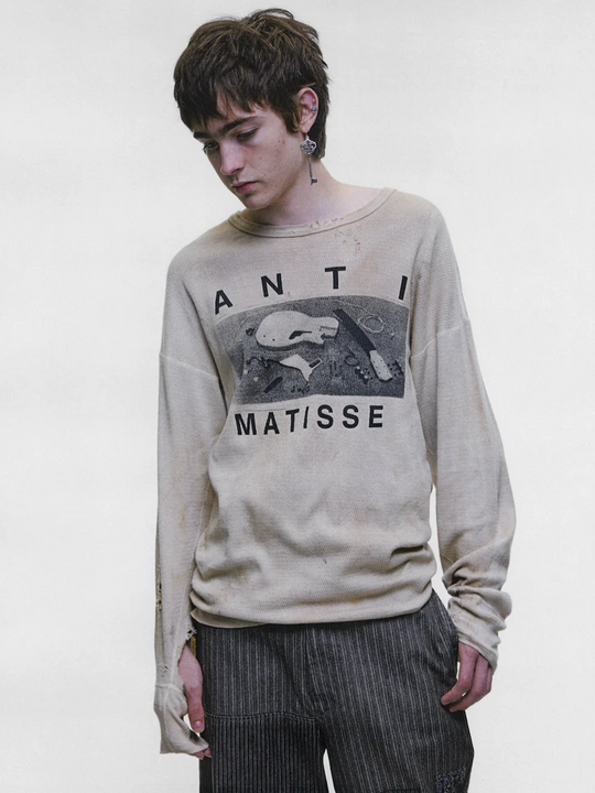Tan t-shirt worn by a person, showing the t-shirt fit