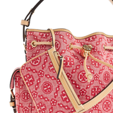 Close up of red bag, showing texture of the leather fabric