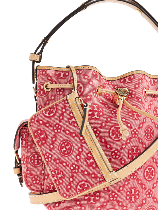 Close up of red bag, showing texture of the leather fabric