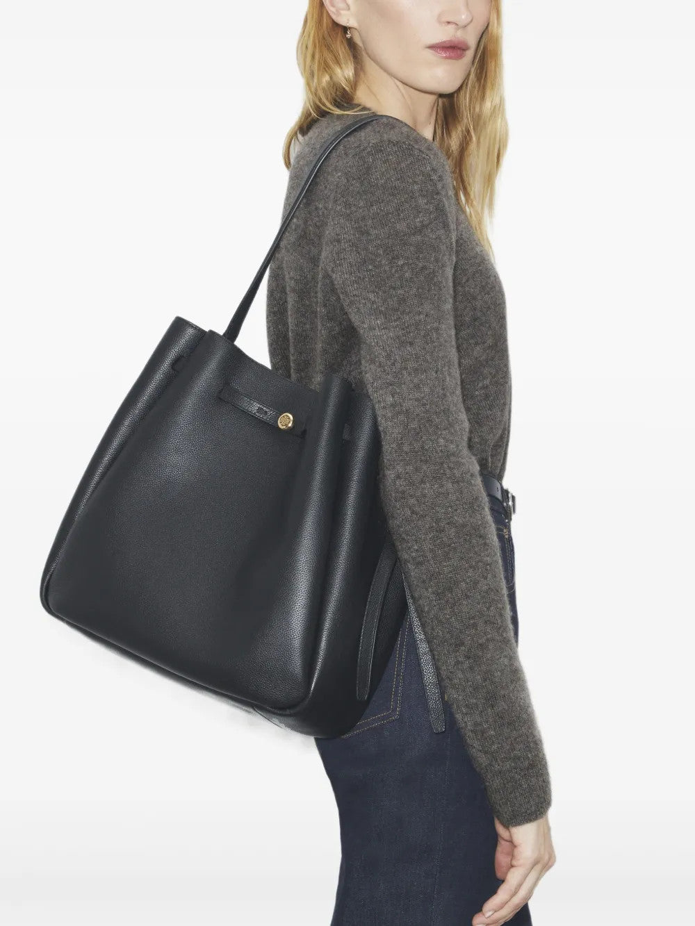 Black bag worn by a person, showing the bag fit