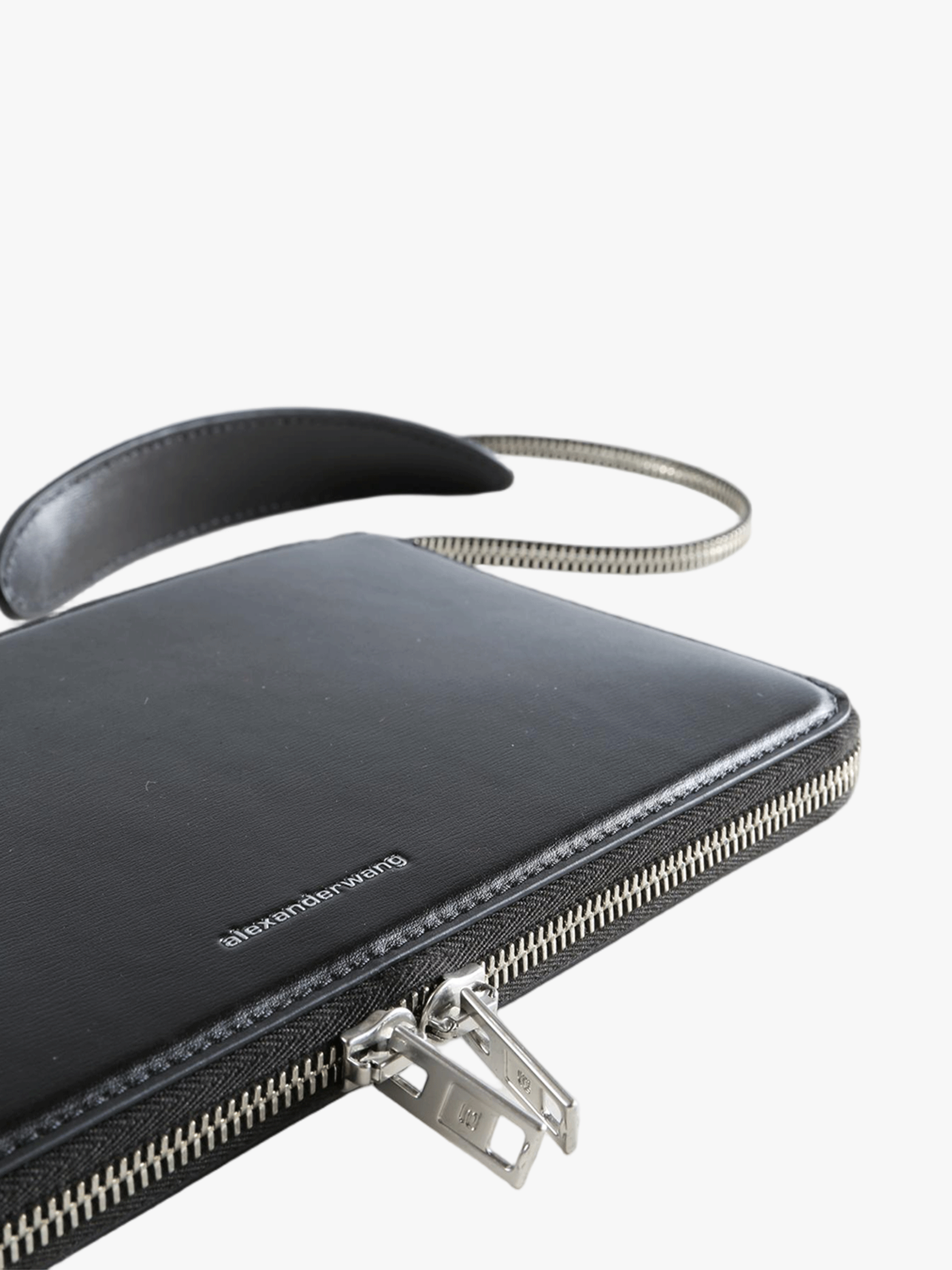 Close up of the black bag, showing texture of the leather fabric