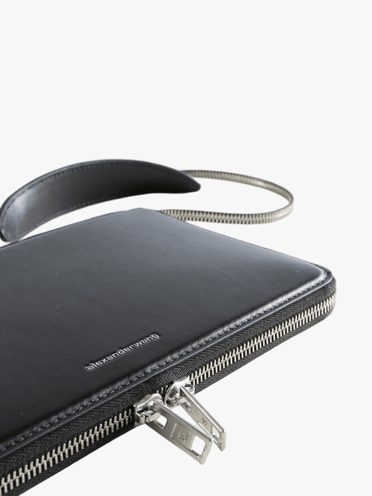 Close up of the black bag, showing texture of the leather fabric