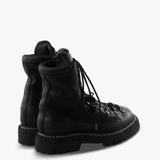 Black boots, back view