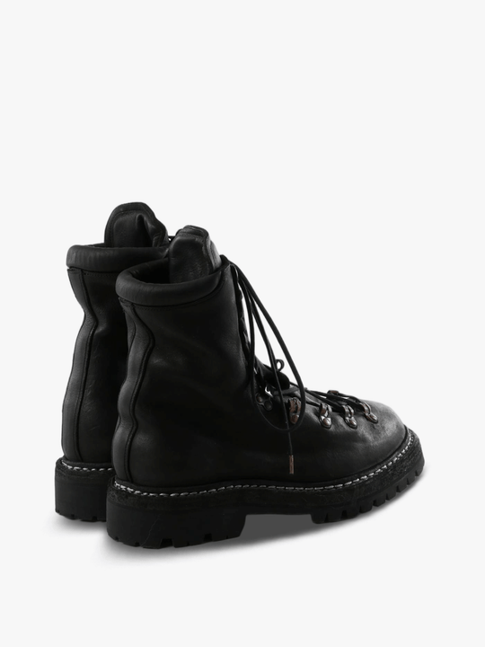 Black boots, back view