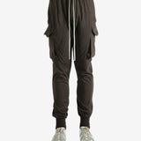 Brown pants worn by a person, showing the pants' fit