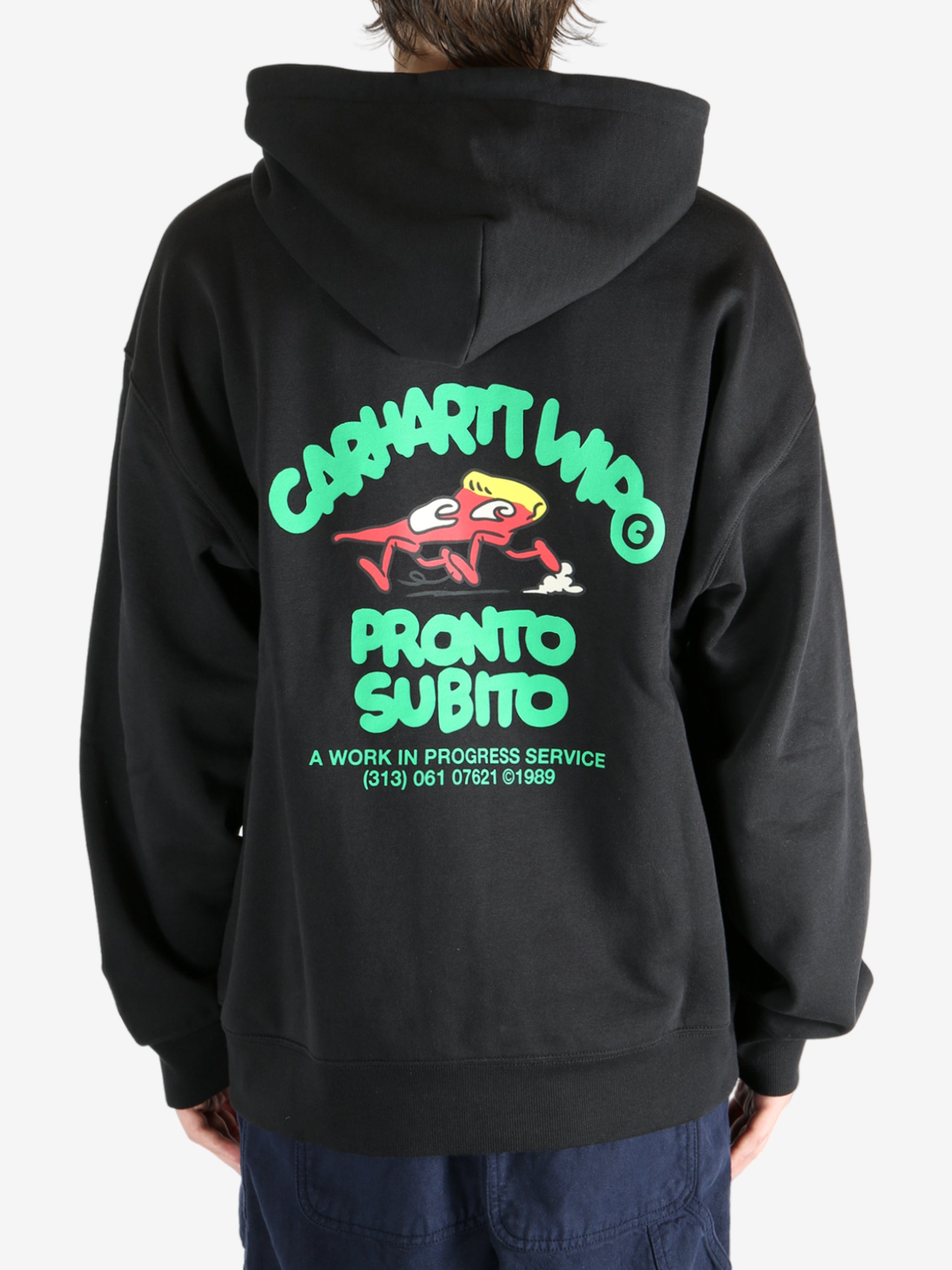 Black jacket worn by a person, showing the jacket's fit