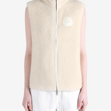 Tan top worn by a person, showing the top fit
