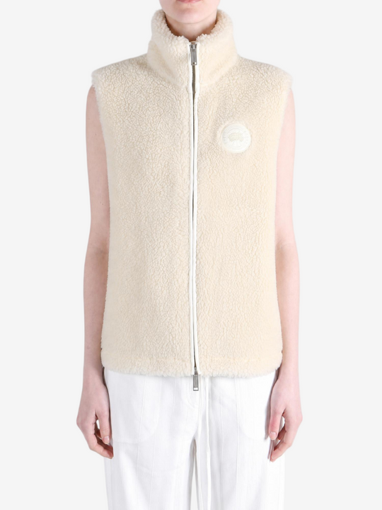 Tan top worn by a person, showing the top fit