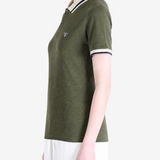 Green shirt worn by a person, showing the shirt fit