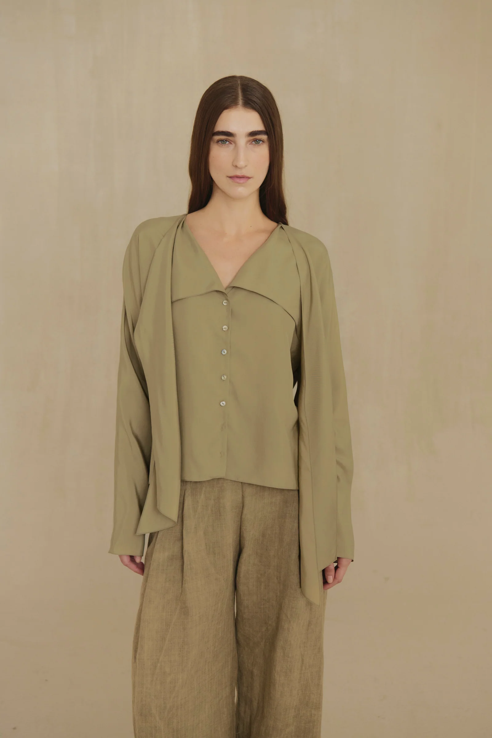 Green shirt, full body view