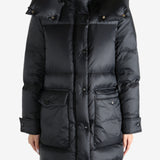 Black jacket worn by a person, showing the jacket's fit