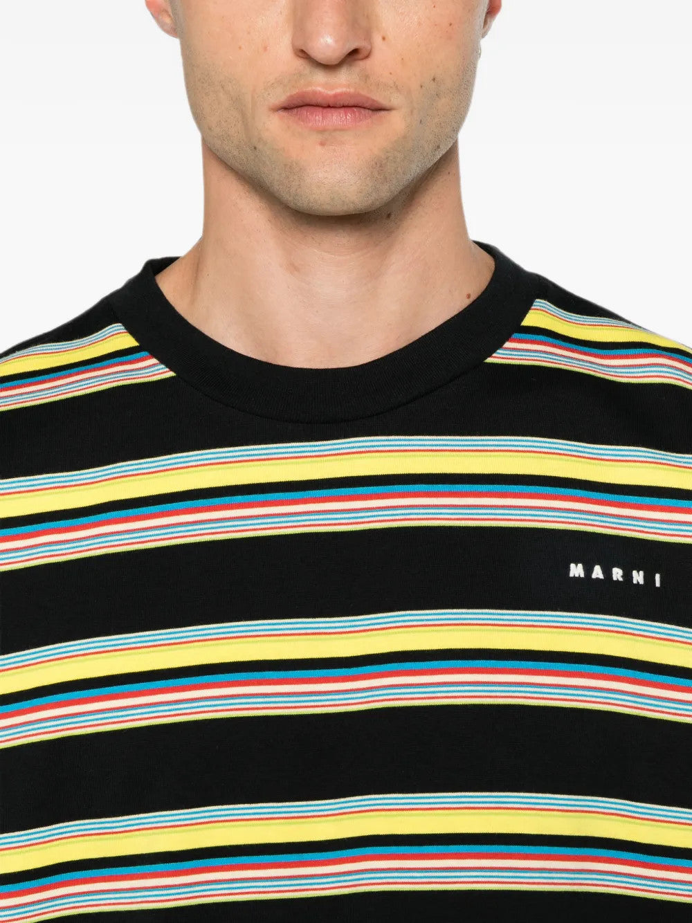 Black t-shirt worn by a person, showing the t-shirt fit