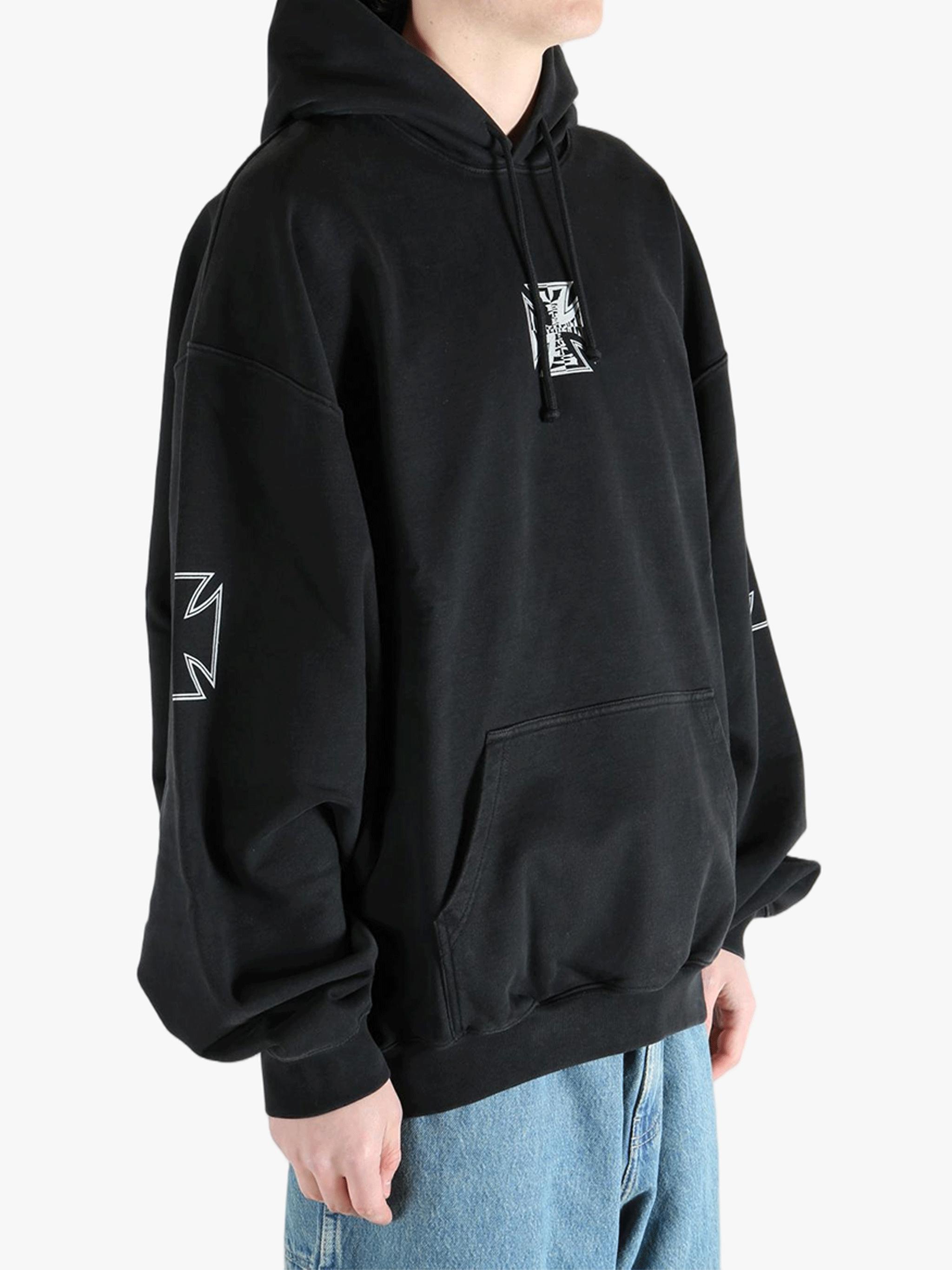 Black sweats-hoodies worn by a person, showing the fit
