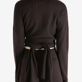 brown sweater worn by a person, showing the sweater fit