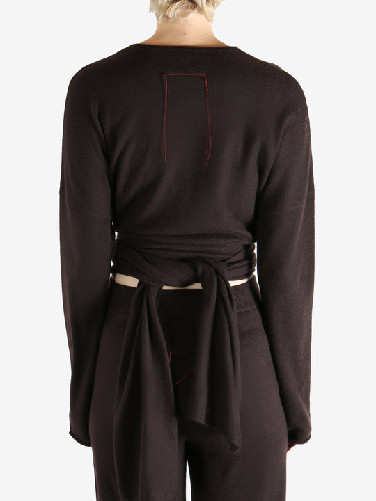 brown sweater worn by a person, showing the sweater fit