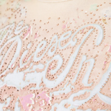 Close up of tan top, showing texture of the Cotton and  Elastane-Spandex fabric