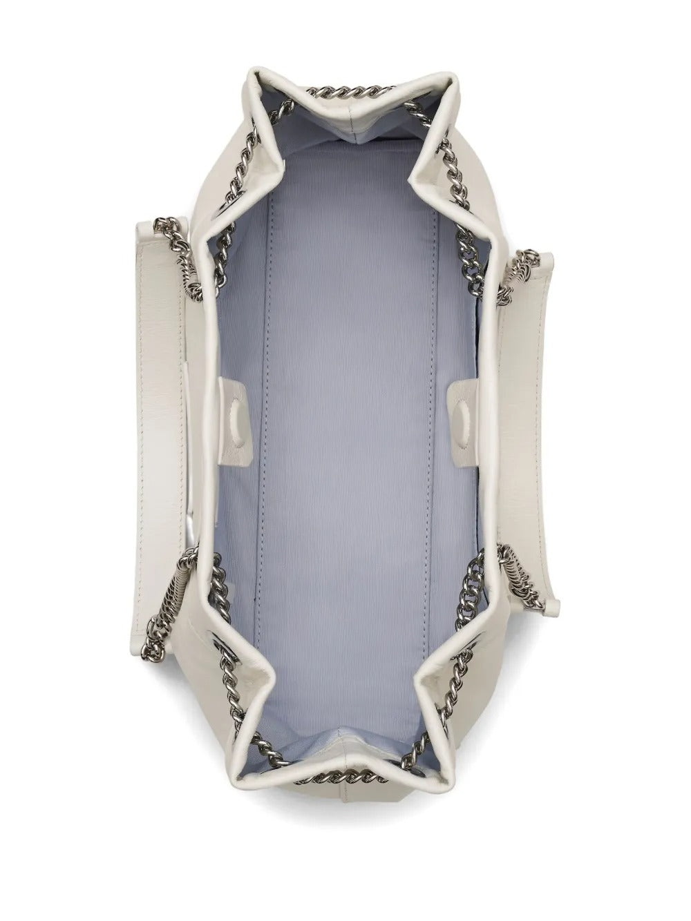 Close up of the white bag, showing texture of the leather fabric