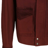 Close up of red jacket, showing the detail of flap pocket