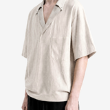 Tan t-shirt worn by a person, showing the t-shirt fit