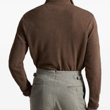 Brown knitwear worn by a person, showing the knitwear fit