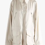 White jacket worn by a person, showing the jacket's fit