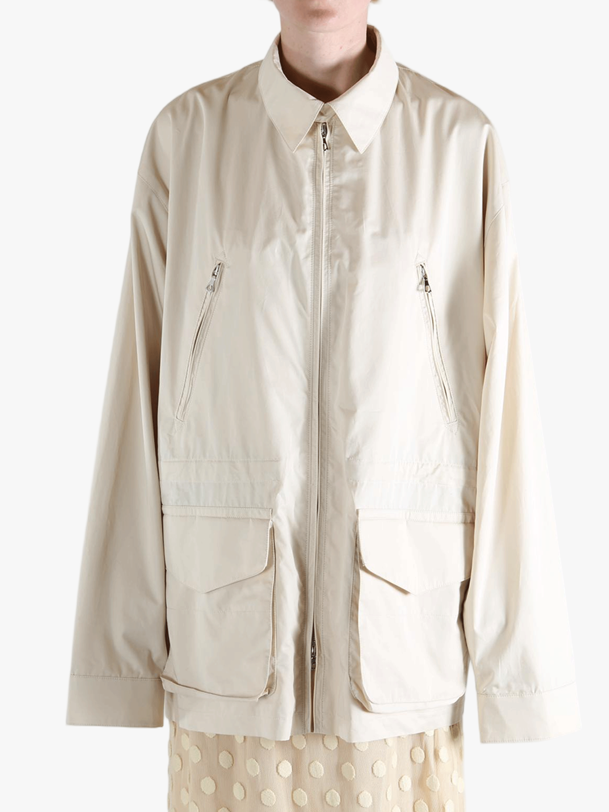 White jacket worn by a person, showing the jacket's fit