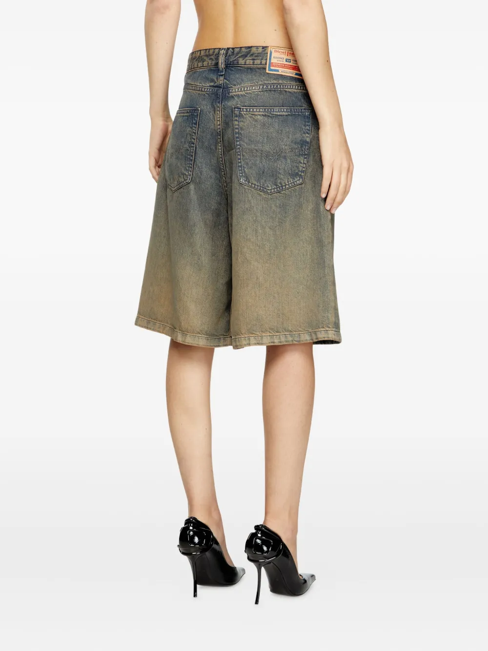 Blue shorts worn by a person, showing the short's fit