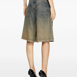 Blue shorts worn by a person, showing the short's fit