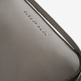 Close up of brown bag,showing texture of the leather fabric