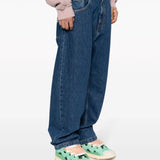 Blue pants worn by a person, showing the pants' fit