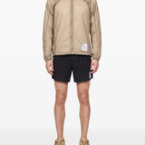 Tan jacket, full body view