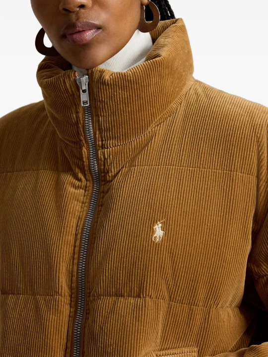 Tan jacket worn by a person, showing the jacket fit