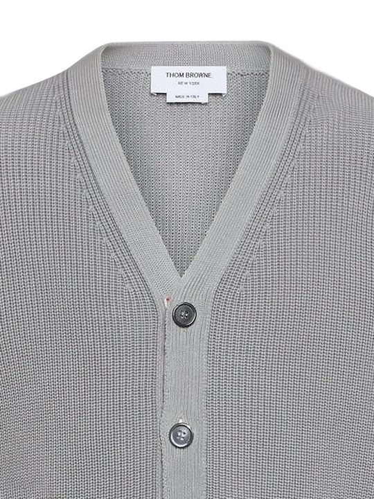 Close up of grey cardigan,showing texture of the wool fabric