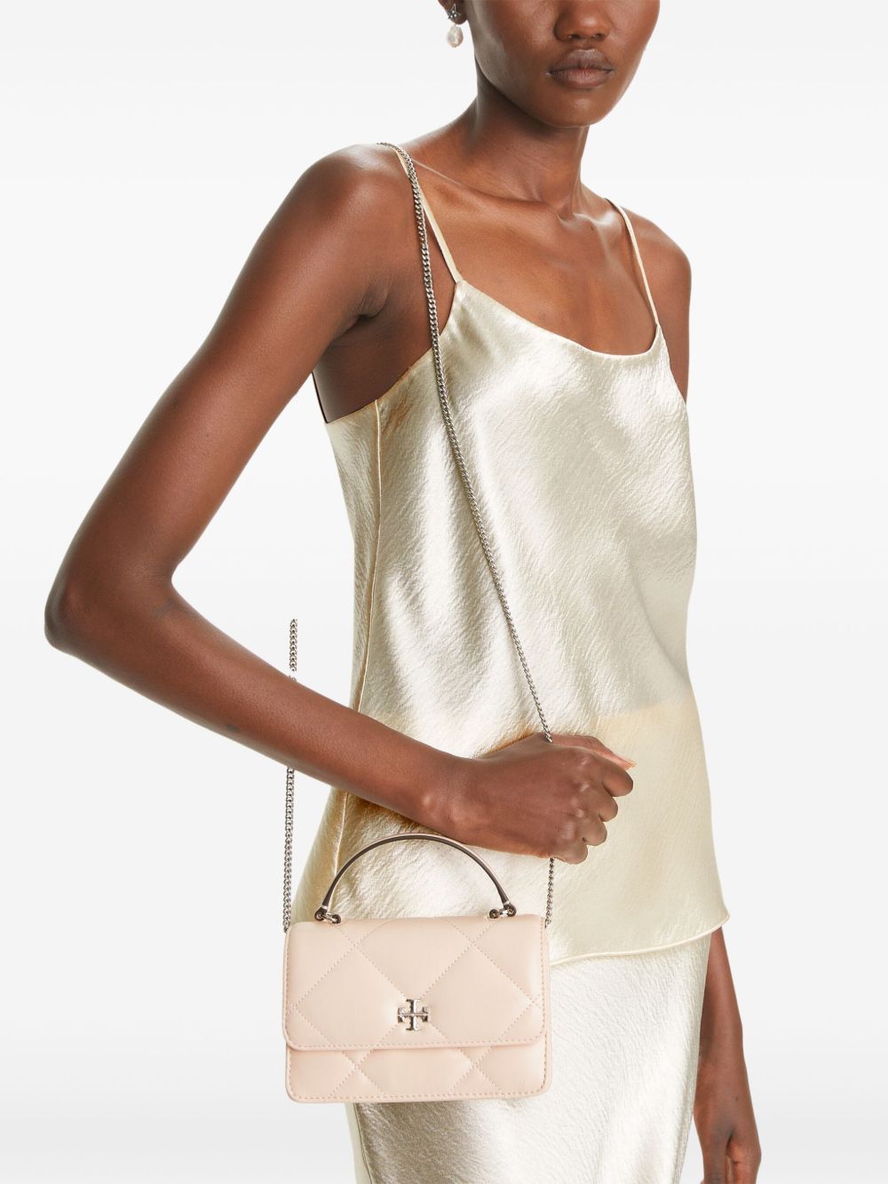 Pink bags worn by a person, showing the bags fit
