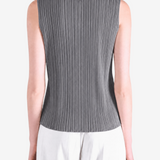 Grey shirt worn by a person, showing the shirt fit
