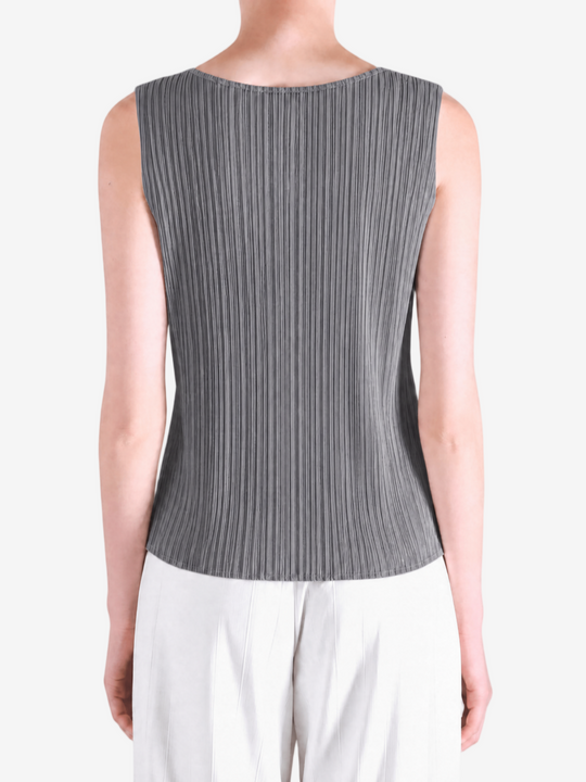 Grey shirt worn by a person, showing the shirt fit