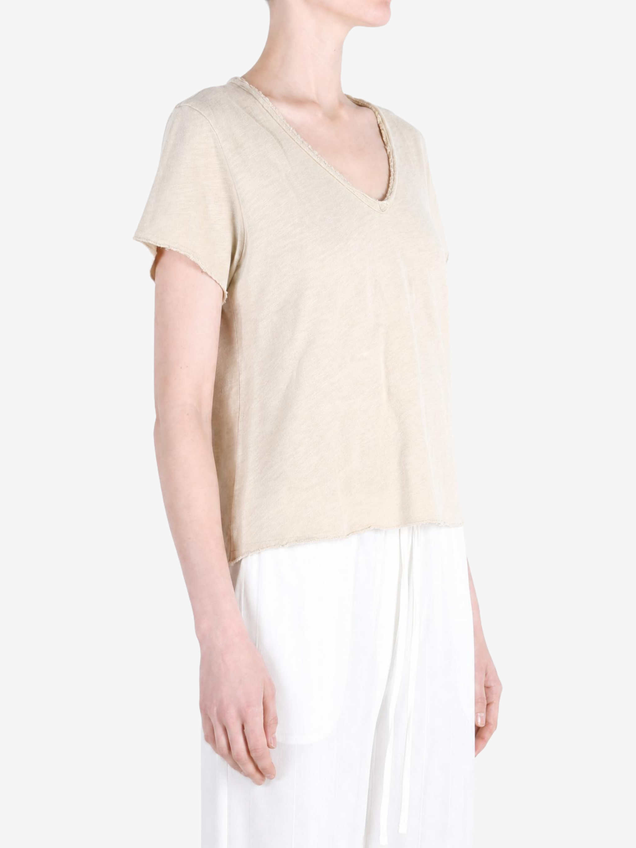 Tan t-shirt worn by a person, showing the t-shirt fit