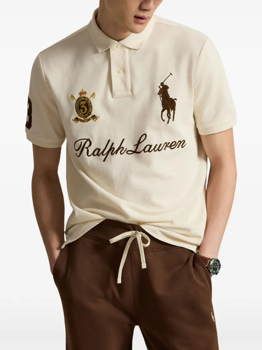 Tan shirt worn by a person, showing the shirt fit