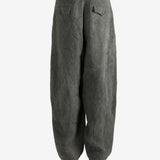 Grey pants worn by a person, showing the pants's fit