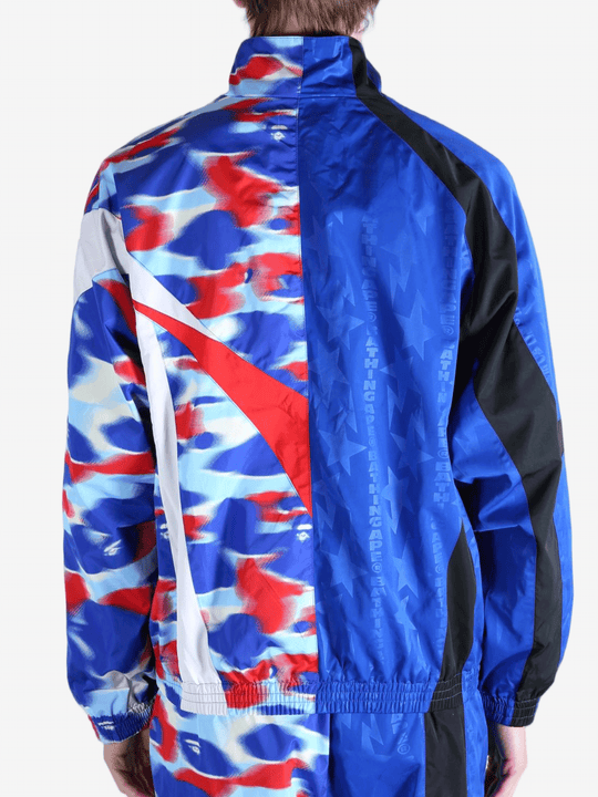 Blue jacket worn by a person,showing the jacket's fit