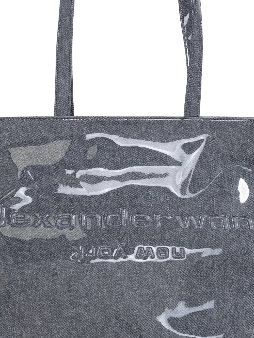 Close up of gray tote bag,showing texture of the polyurethane fabric